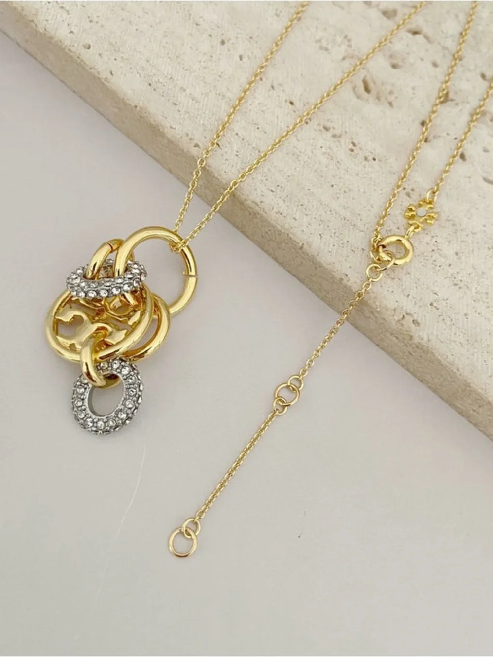 Tory Burch Gold-Tone Interlocking Circle Pendant with Crystal Accents